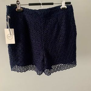 Never worn with tags. 1901 navy eyelet short. Size 8